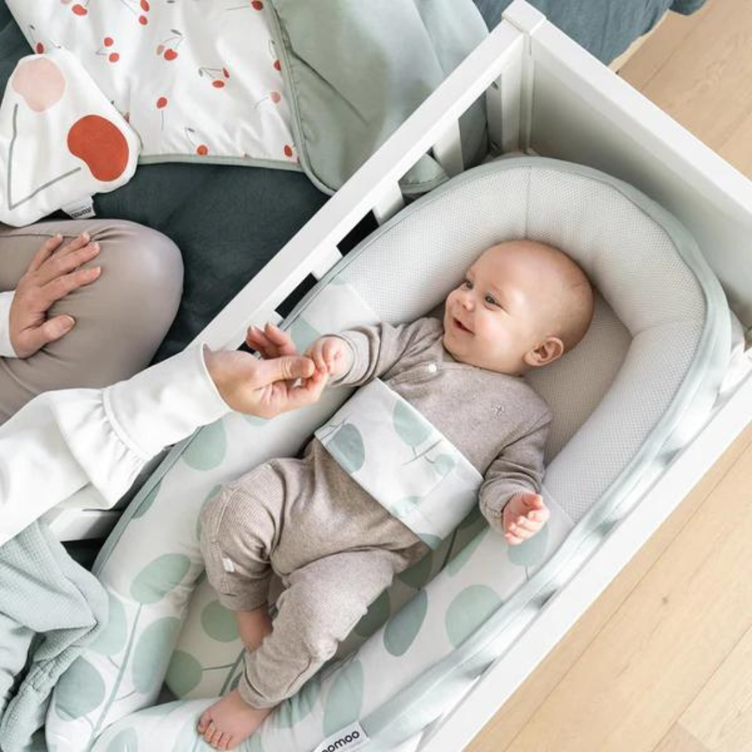 Doomoo - Baby Nest din bumbac organic Cocoon Leaves Aqua Green