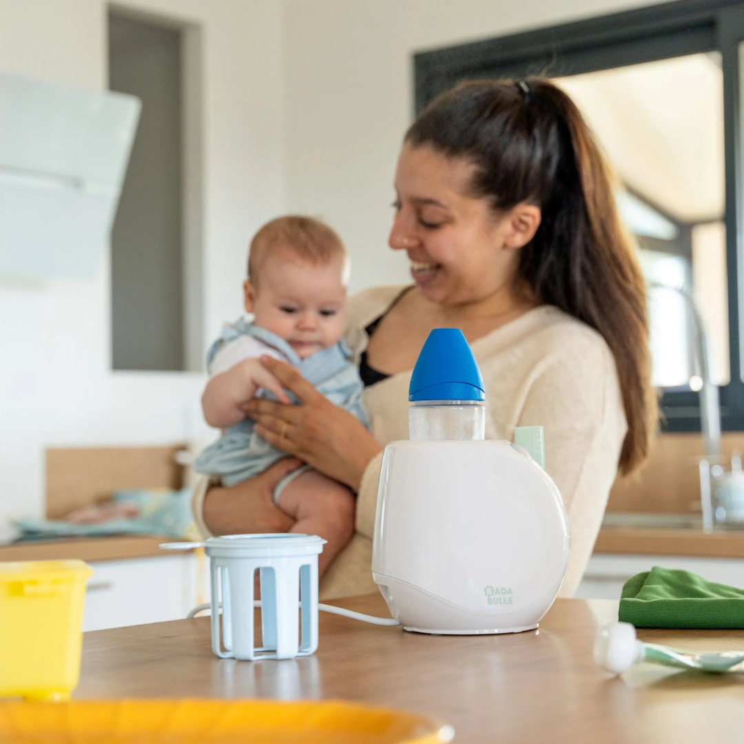 Badabulle – Incalzitor de biberoane/borcane pentru casa si masina Easy+ Pastel