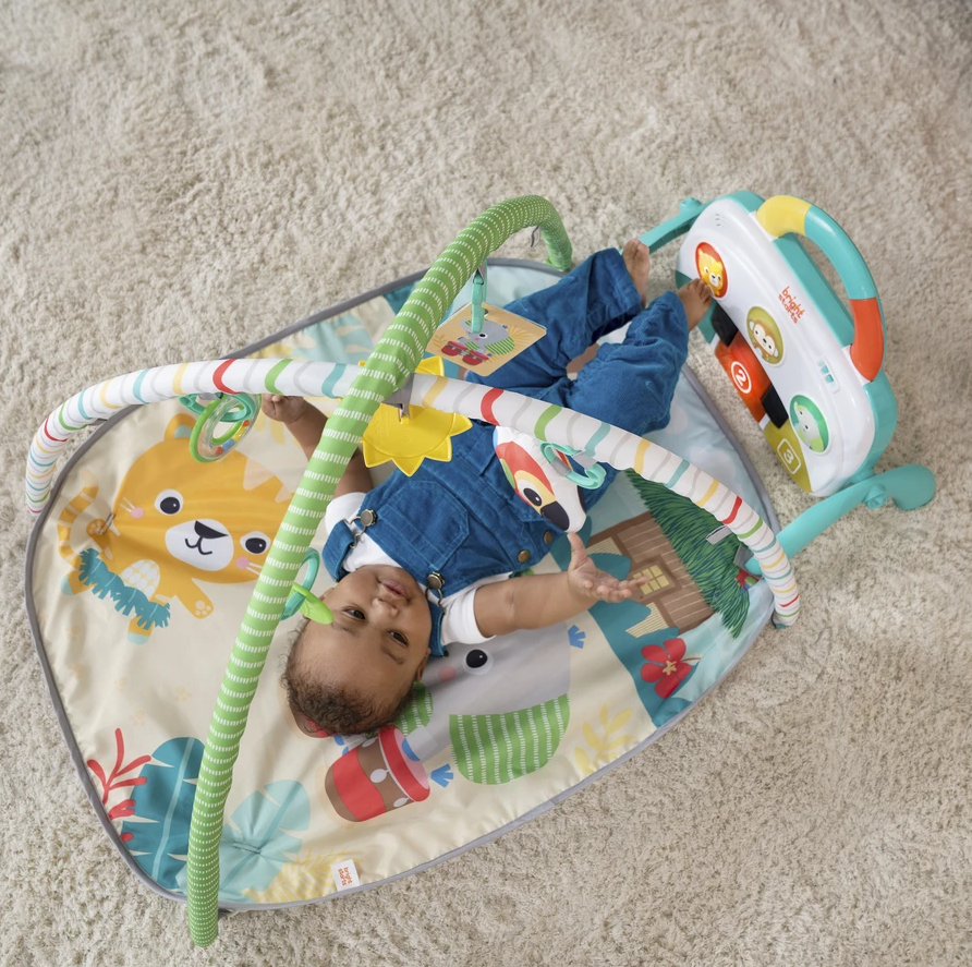 Bright Starts - Salteluta de activitati 4 in 1 Groovin' Kicks Tropical Safari