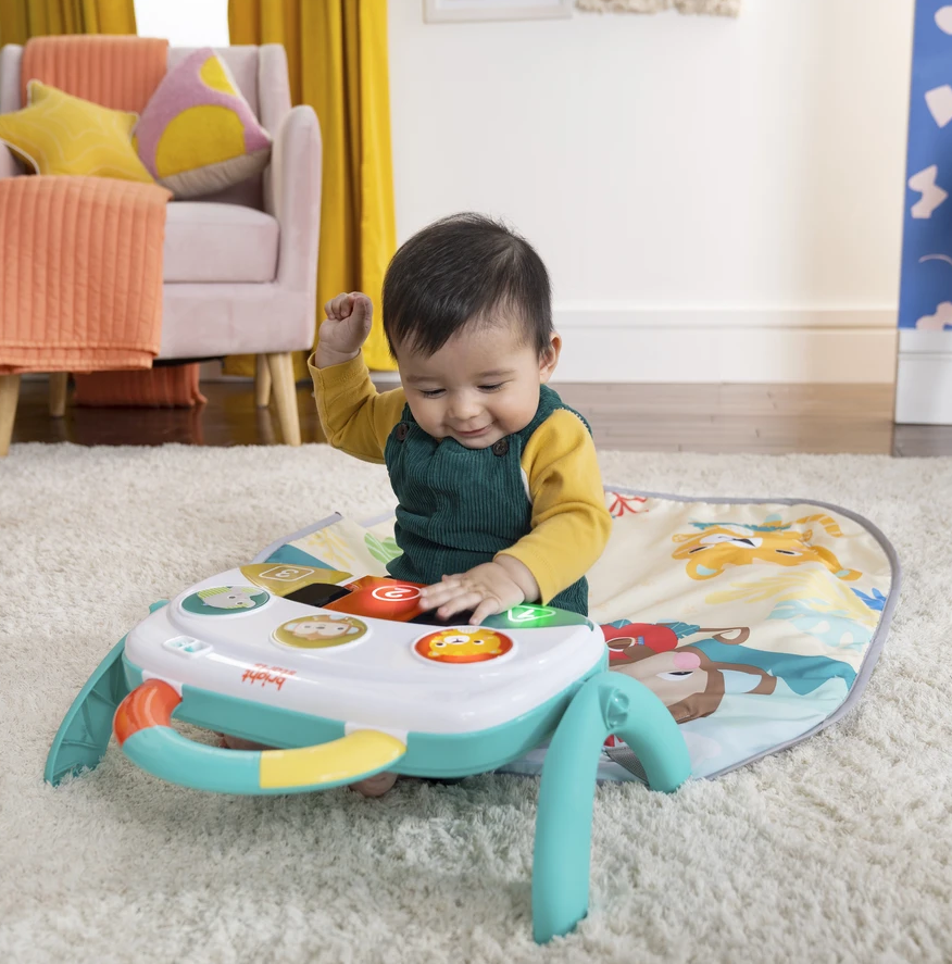 Bright Starts - Salteluta de activitati 4 in 1 Groovin' Kicks Tropical Safari