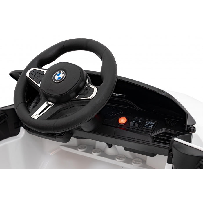 Masinuta electrica cu telecomanda BMW M4, roti EVA, scaun tapitat, 112x71x46 cm, putere 70W - Alb
