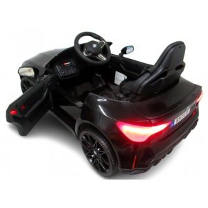 Masinuta electrica cu telecomanda BMW M4, 110x70x50 cm, varsta 1-5 ani, roti EVA, scaun din piele ECO, putere 90W - Negru